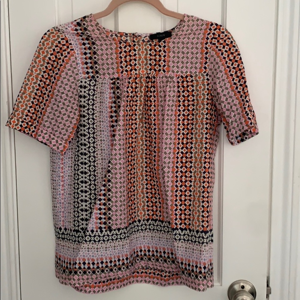 Patterned blouse.